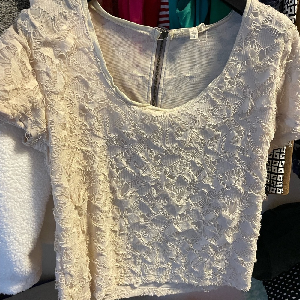 Small cream shirt